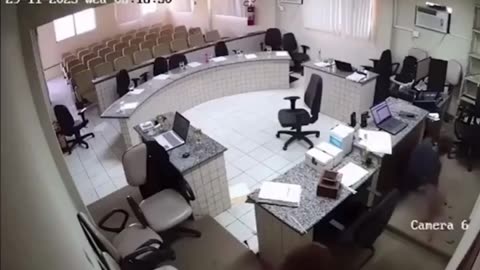 Dramatic footage of a man shooting the alleged killer of his father during a murder trial.