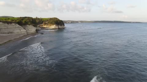 Aerial walk along a rocky coast