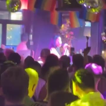 Katie Price puts on busty display as she sings at Manchester Pride
