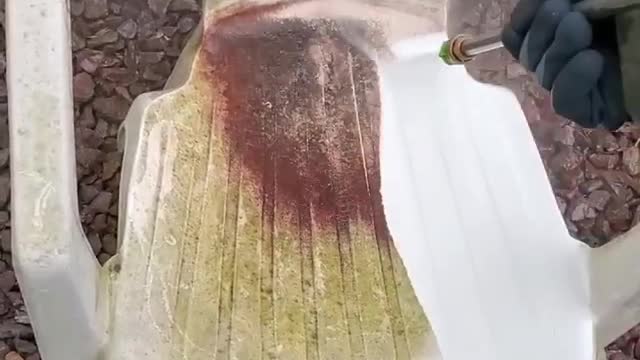 removing dirt from the chair with a water jet