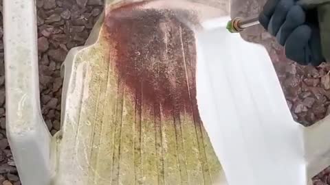 removing dirt from the chair with a water jet