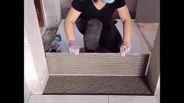 Young Girl With Great Tiling Skills