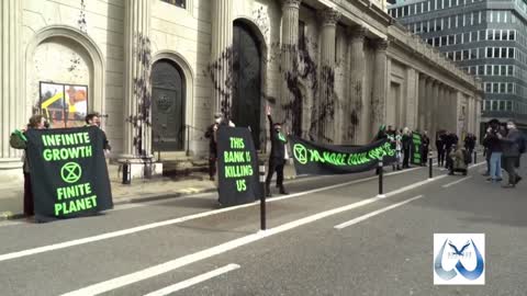 Climate activists spray black dye at Bank of England in "Money Rebellion"
