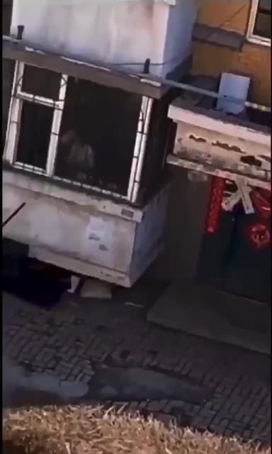 China government blocks exits from apartment buildings to prevent people living them/