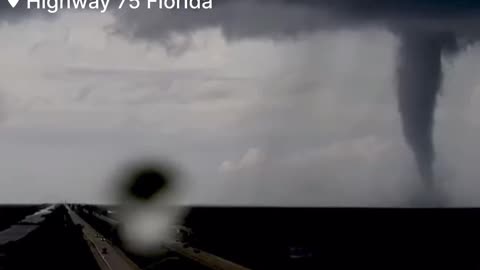 Hurricane Milton - Traffic cameras on I-75 at Miccosukee, Florida, capture a tornado crossing the highway