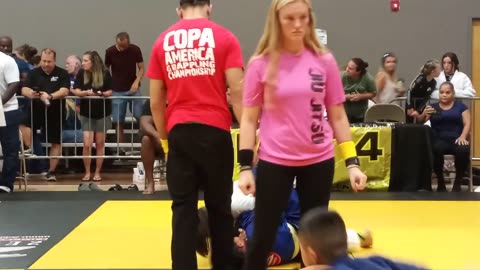 Girl fights boy gi jiu jitsu