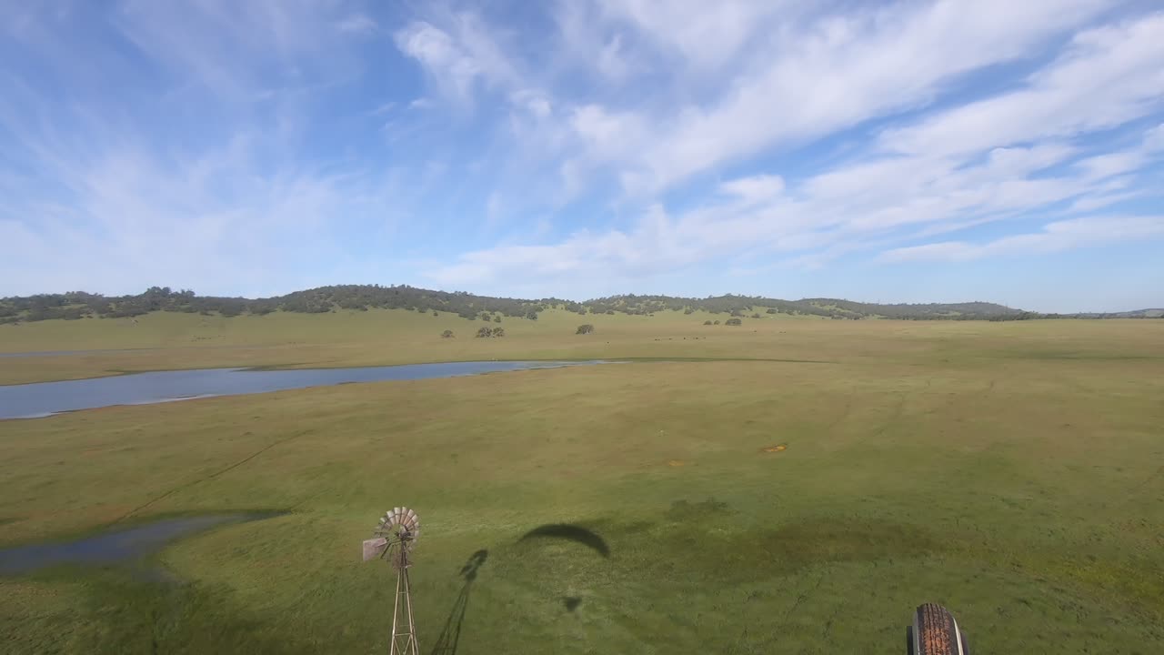 240420Go_PPGBlkHwkSaltSpringLakeShadowWindmill