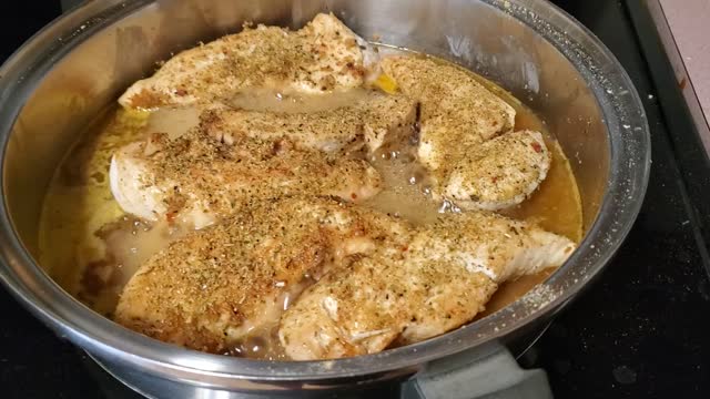 Cooking some chicken for chicken and rice tonight.