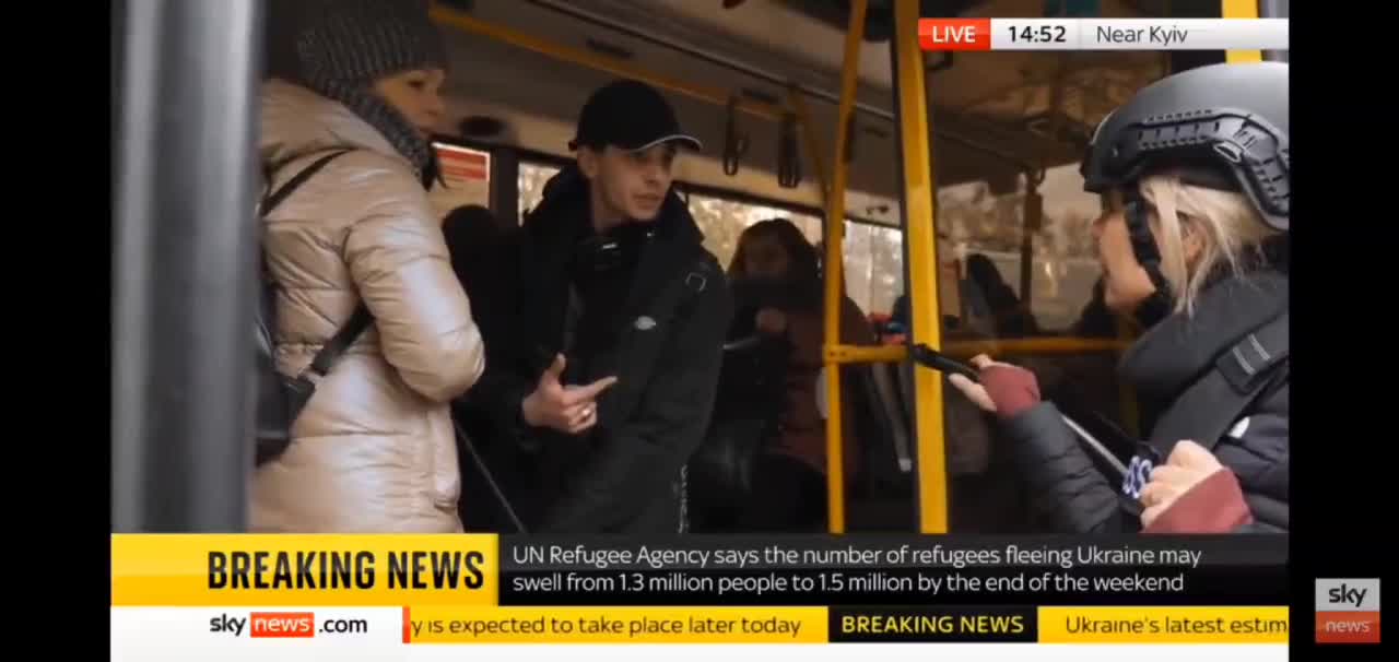 Sky news interviewing people evacuating near Kiev