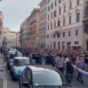 Thousands of Italian men shouting “where are the anti fascist”