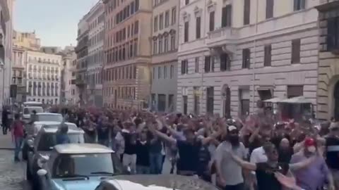 Thousands of Italian men shouting “where are the anti fascist”