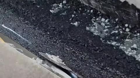 cylinder cutting asphalt