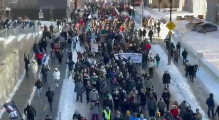Quebec Canada - Citizens join other countries walking the streets chanting Liberta
