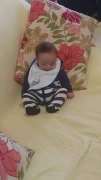 Adorable baby discovers feet for first time