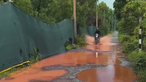 Riding bikes through village road