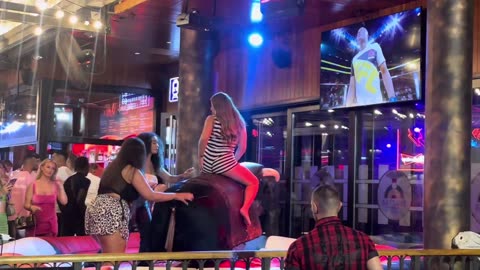 GIRL TAKE ON THE BULL! Benidorm Bull Ride. Mechanical Bull EPIC FAIL