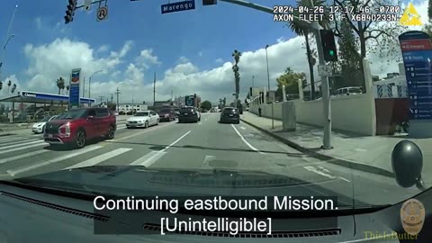 LAPD dashcam shows officer knocking bicyclist down after a brief pursuit on the freeway