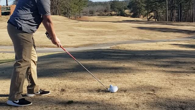 Chris golfing