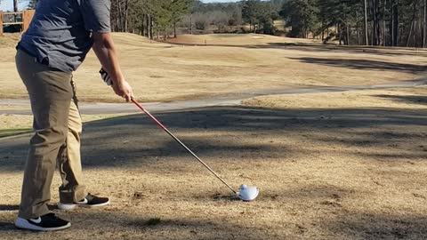 Chris golfing