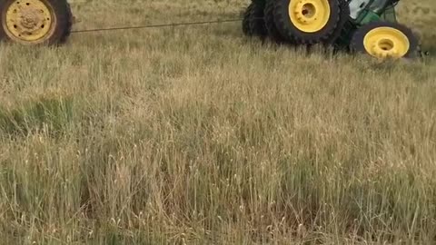 Tractor Swallowed by Surprise Sinkhole