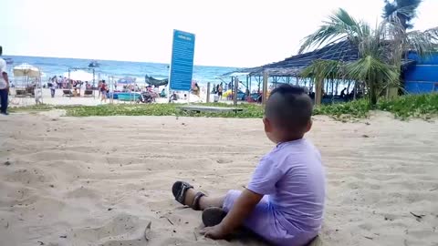 He really like the sand