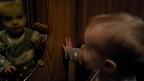 Haley playing in mirror