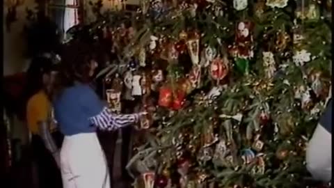 Nancy Reagan and Larry Hagman as Santa Claus for the White House Christmas Tour on December 9, 1985