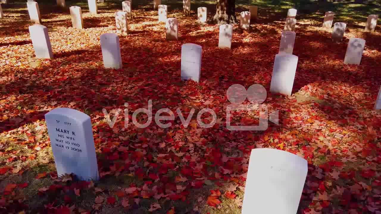 Slow Moving Shot Along Grave Sites In Arlington National Cemetery Washington Dc With Fall Colors 1