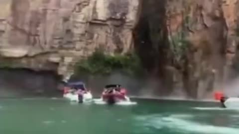 Cliff Collapses On Boat