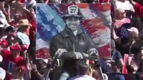 Artist Scott LoBaido unveils his mural of Corey Comperatore at Trump's rally in Butler, PA