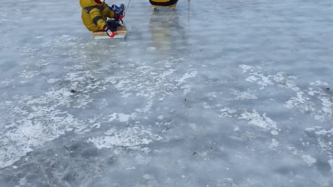 Dad and son's ice sled