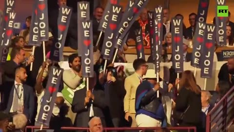 Protesters unfurl banner during Biden’s speech at DNC