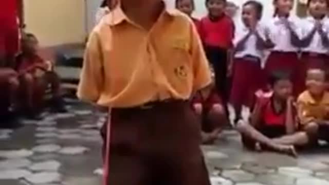 little kids laugh at the competition