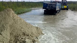 Russian KAMAZ stuck in the mud