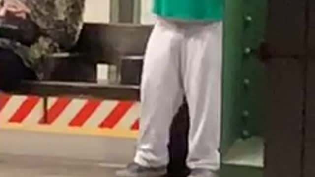 Subway rabbit man records himself singing in subway station