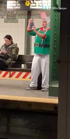 Subway rabbit man records himself singing in subway station