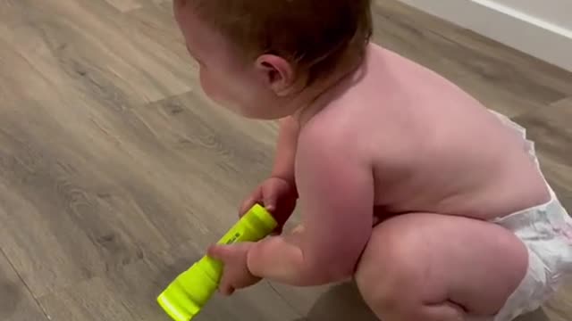 urgently watch a very cute video: When these two find a flashlight...