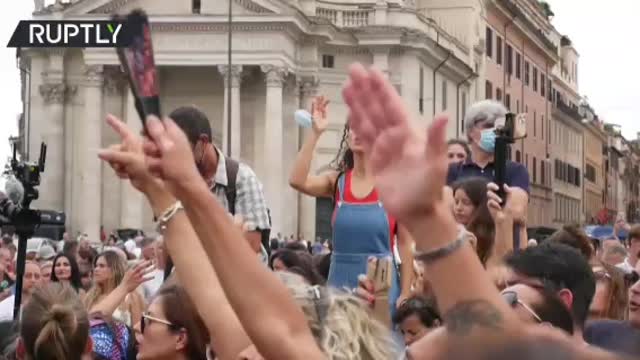 Thousands protest Draghi's health pass in Italy.