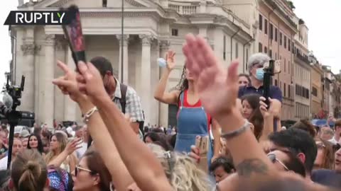 Thousands protest Draghi's health pass in Italy.