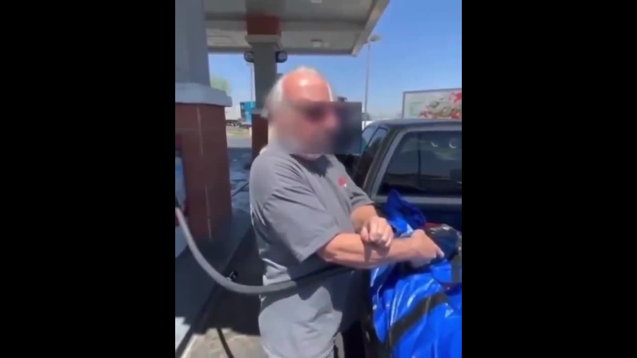 Man Fills Truck Bed With Gasoline