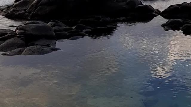 Waves crashing on rocks