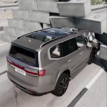 Destroying concrete wall with luxury SUV