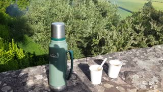 2 cups of coffee looking over at minehead Devon