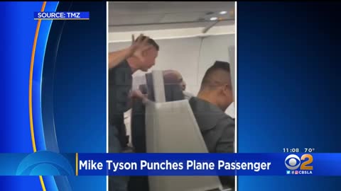 Video shows Mike Tyson punching man on plane