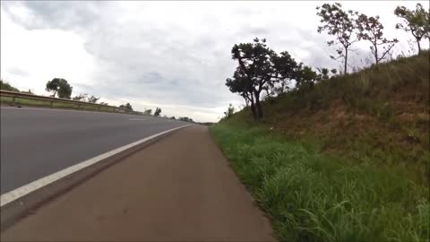 Cyclist Doing 60 mph Behind Truck in Brazil