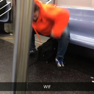 Woman in subway fighting the air