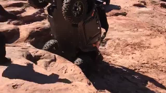 RZR goes over backwards on Moab Trail