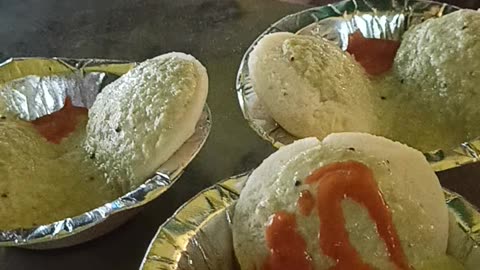 Indian Idli chatni Rice bread and herb sauce