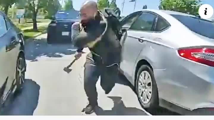 Car Randomly Pulls Up Next to Cop and Attacks Him With an Axe