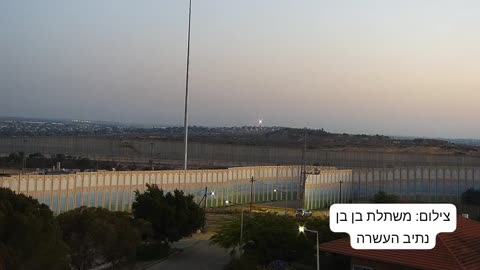 Surveillance camera footage shows two rockets launched from the Gaza Strip at